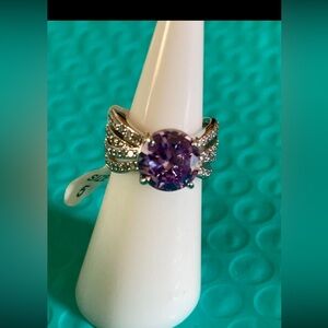 Bomb party ring for $15. Rhodium plating with lavender cubic zirconia
